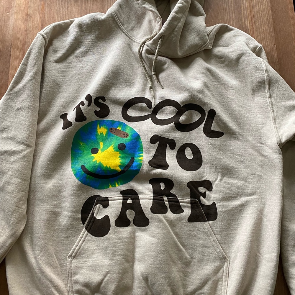 LONELY GHOST Cream Hoodie with Tie-Dye Smiley Graphic